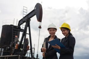 Two Female Engineers Working Oil Pumps | Flipflage